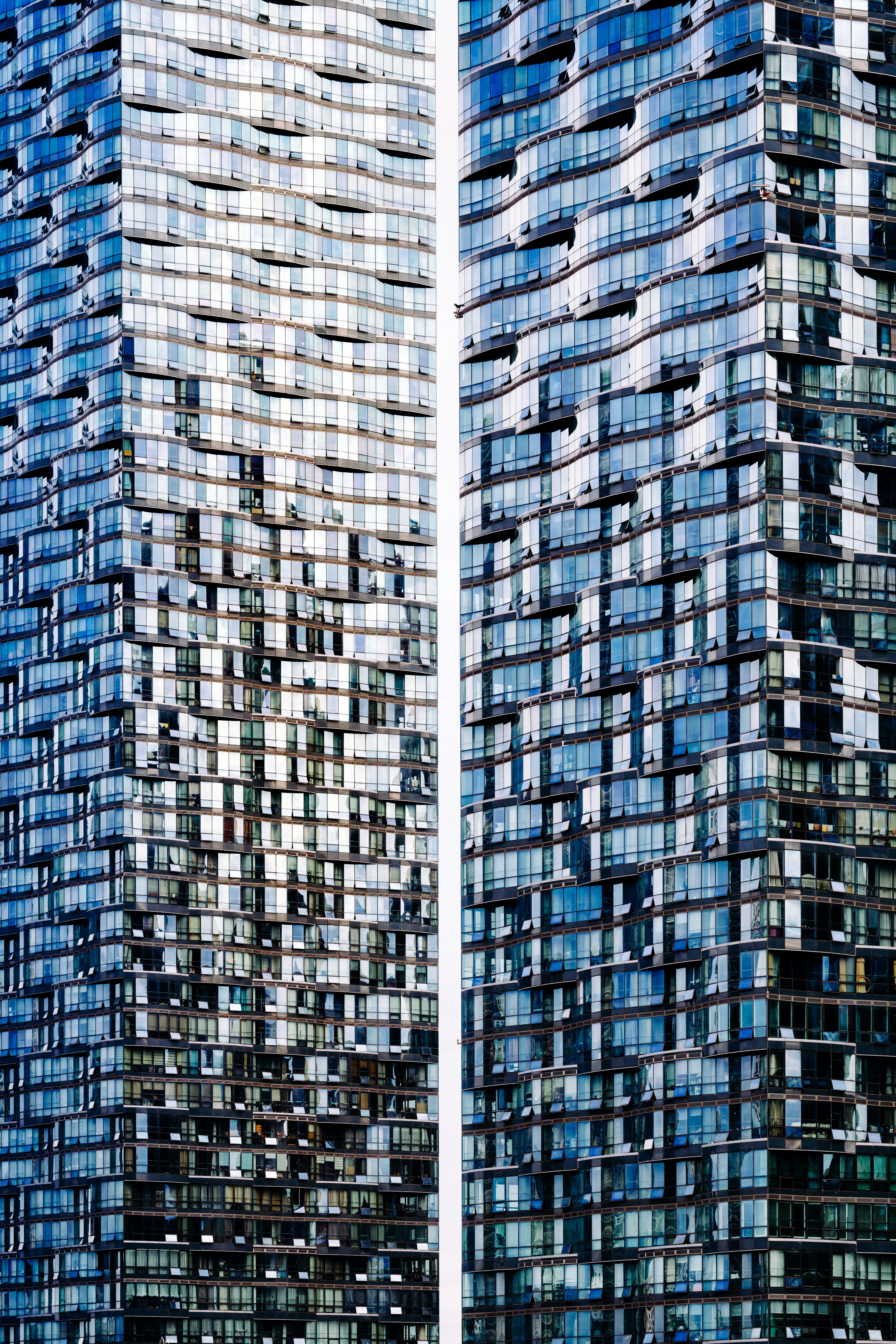 black glass-panel building collage